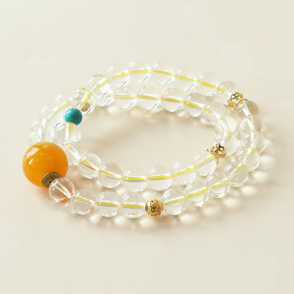 Ivory River Solace Crystal Bracelet featuring natural White Quartz and Dyed Turquoise gemstone beads with AI companion bead in clean studio white background presentation