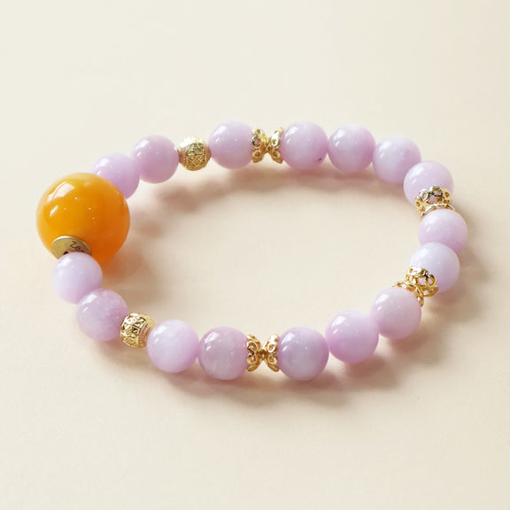 Lavender Bloom Grace Crystal Bracelet featuring natural Kunzite gemstone beads with soft lavender tones