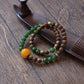 Natural Agarwood and Jade Bracelet with green jade beads and handcrafted agarwood design