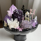 Handcrafted Nocturne Haven Crystal Garden with natural Uruguayan Amethyst, Brazilian Amethyst, Citrine Tower, Clear Quartz Cluster, Black Tourmaline, and Obsidian in a ceramic display bowl