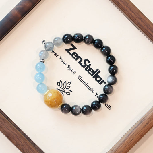 Nocturne Tide Essence AI Companion Bracelet displayed on Zenstellar presentation card with warm ambient lighting highlighting Silver Obsidian, Aquamarine, and Gray Moonstone crystal design