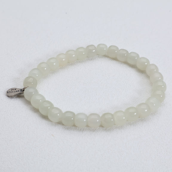 Detail of the 925 sterling silver charm on a Hetian jade bead bracelet