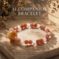 Roselle Haven Facet Crystal Bracelet crafted with Faceted Sunstone and White Quartz gemstones with signature AI companion bead displayed on warm natural stone background