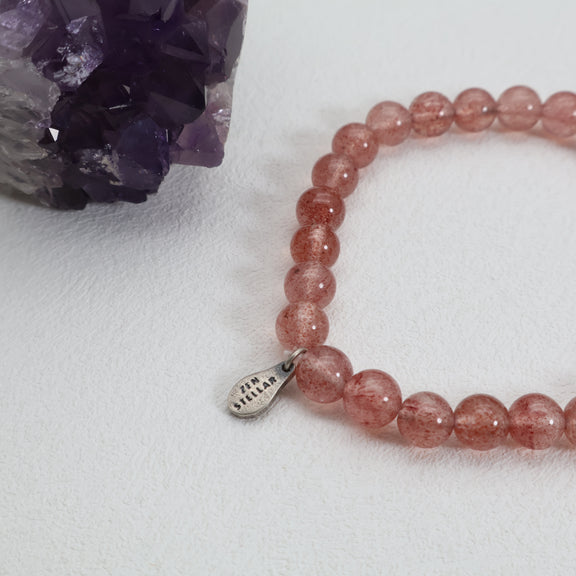 Strawberry quartz bracelet on an elastic stretch cord with 7mm beads for comfortable wear