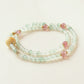 Spring Meadow Delight Green Agate & Strawberry Quartz Crystal Bracelet featuring natural green agate beads, strawberry quartz accents and handcrafted gemstone design