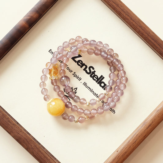 Twilight Veil AI companion crystal bracelet arranged in layered circle composition with purple agate, amethyst and citrine on framed Zenstellar display background