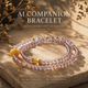 Twilight Veil alignment crystal bracelet featuring purple agate, amethyst and citrine beads arranged in dual layered design on warm natural stone background