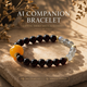 Garnet and Grey Moonstone crystal bracelet designed for emotional resilience and grounding inner stability.
